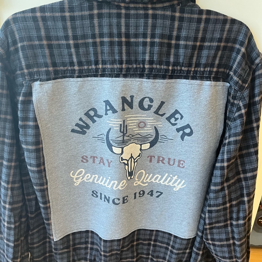 Upcycled flannel with Wrangler tee patch